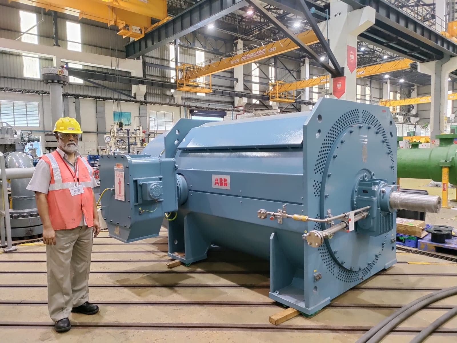 One of our founders pictured near a large 3 MW ABB Induction motor used in petrochemical application